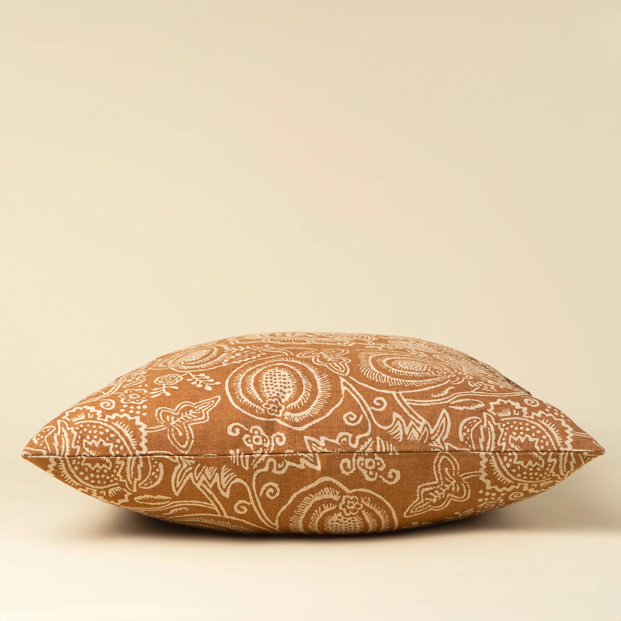 Eden Terracotta feather cushion 24x24