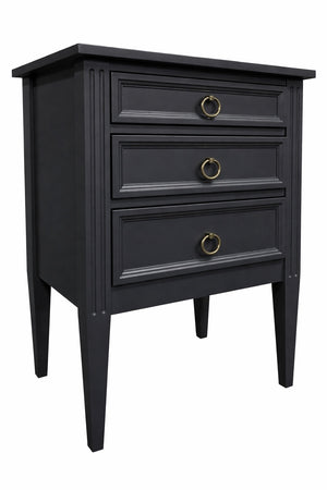 Black three-drawer nightstand with gold handles on a white background