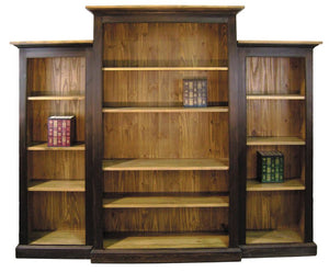 Three wooden bookshelves in dark brown with books 