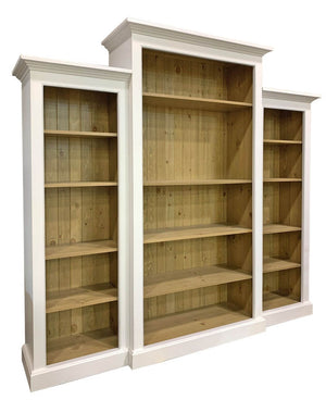 Trio of wooden bookshelves with white frame 