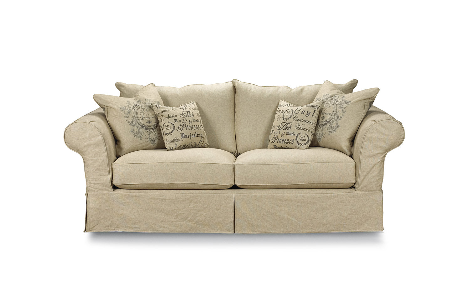 A beige sofa with rolled arms and decorative pillows, featuring a plush backrest and seat cushions.